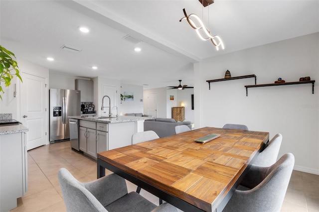 dining room with light tile patterned floors, visible vents, ceiling fan, and recessed lighting