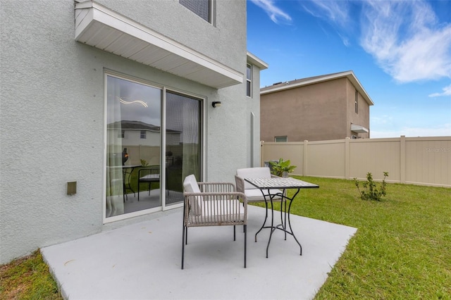 view of patio with fence