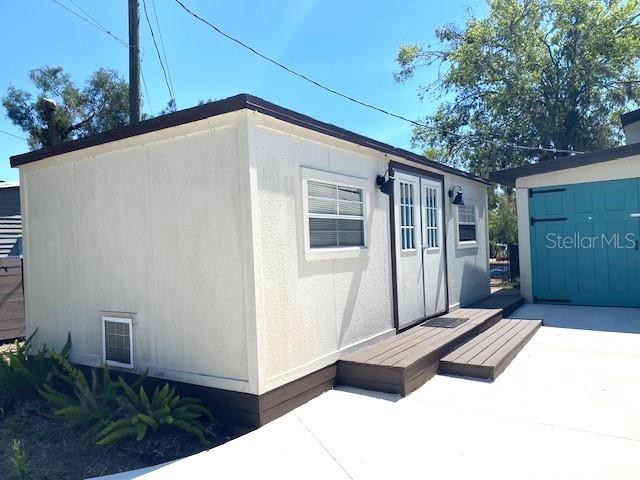 view of outbuilding featuring an outdoor structure