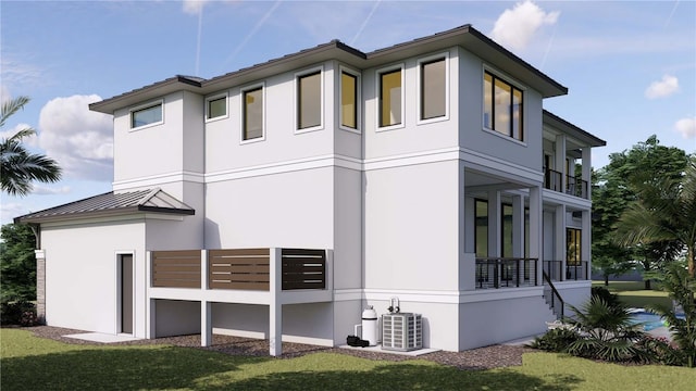 view of property exterior with stucco siding, a balcony, metal roof, and a standing seam roof