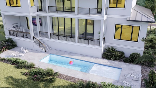 view of swimming pool featuring a patio area