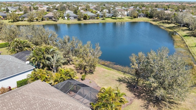 aerial view with a residential view and a water view