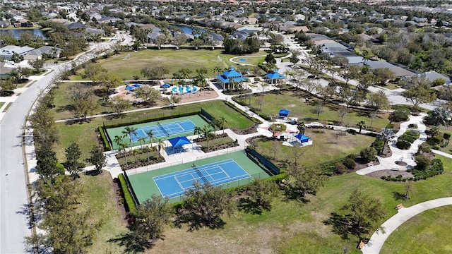 birds eye view of property featuring a residential view and a water view