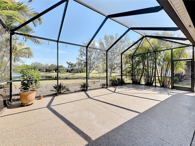 view of patio / terrace featuring a lanai