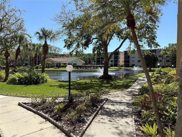 view of home's community featuring a water view