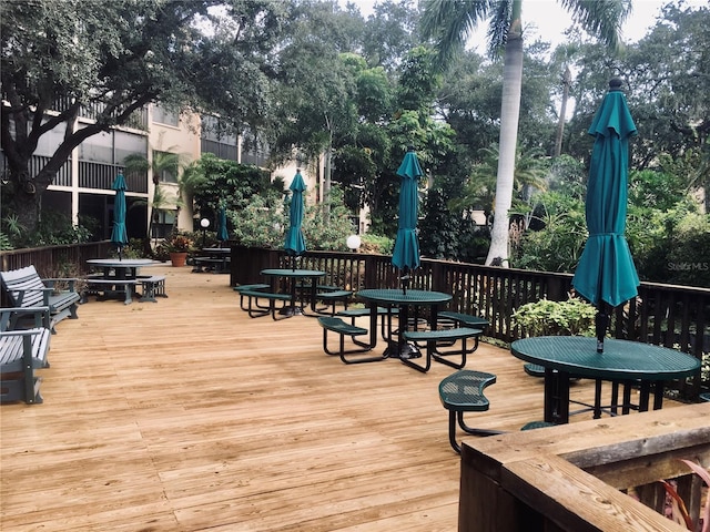 deck with outdoor dining space