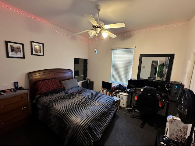 carpeted bedroom featuring ceiling fan