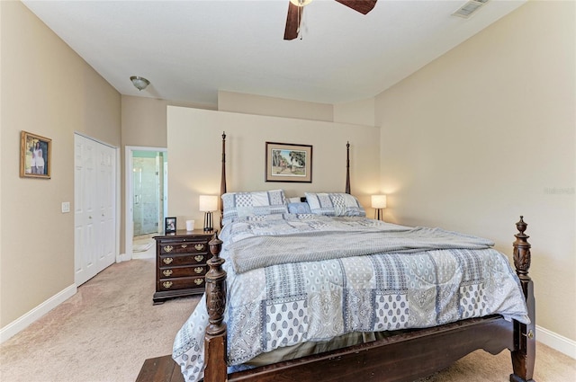 carpeted bedroom featuring baseboards, visible vents, and ceiling fan