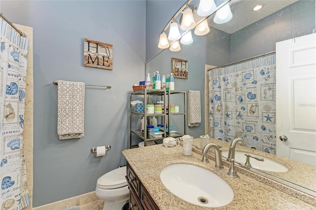 bathroom with a shower with curtain, baseboards, toilet, and vanity