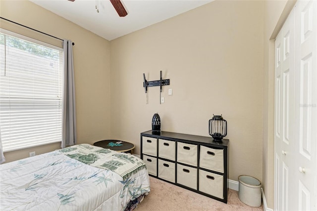 bedroom featuring baseboards, carpet, and ceiling fan