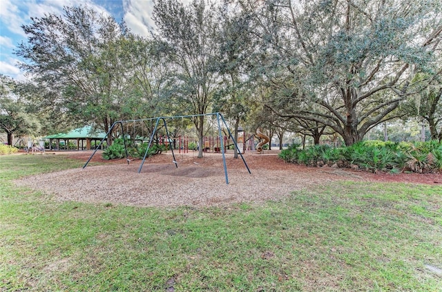 community playground featuring a yard