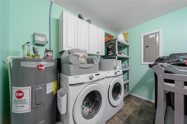 laundry area featuring electric panel, washing machine and dryer, water heater, cabinet space, and baseboards