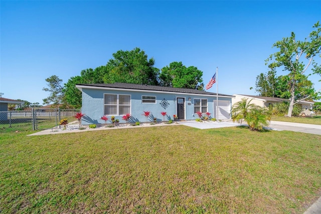 ranch-style house with a front lawn, fence, stucco siding, driveway, and an attached garage