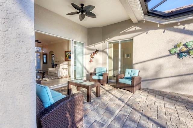 view of patio with ceiling fan