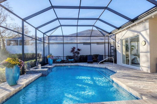 pool featuring a patio area and a lanai