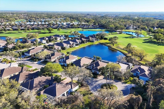 bird's eye view featuring a residential view, view of golf course, and a water view