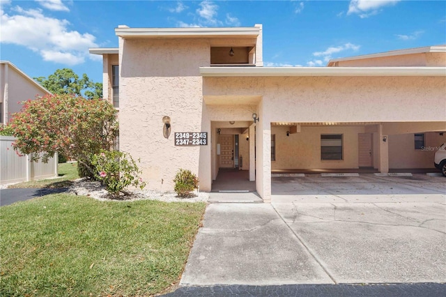 2347 Beneva Ter Unit 2251, Sarasota, FL 34232 - view of front of property featuring a front lawn and stucco siding