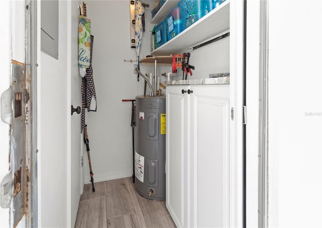 utility room with water heater