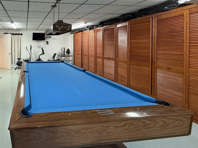 rec room with pool table and a paneled ceiling