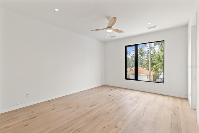 1716 9th St, Sarasota, FL 34236 - empty room with ceiling fan, light wood finished floors, recessed lighting, baseboards, and visible vents
