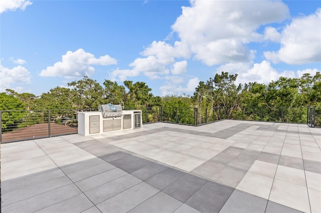 1716 9th St, Sarasota, FL 34236 - view of patio featuring an outdoor kitchen and a grill