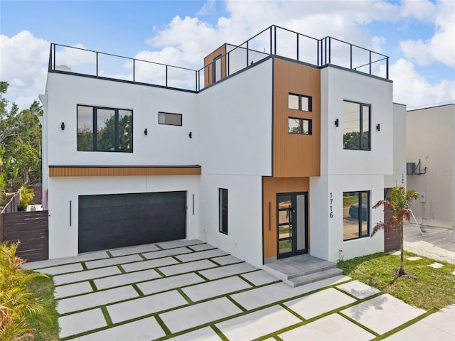 1716 9th St, Sarasota, FL 34236 - contemporary house with a garage, stucco siding, and driveway