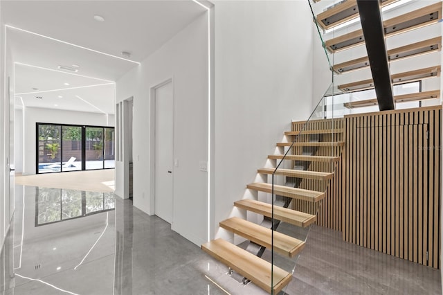1716 9th St, Sarasota, FL 34236 - stairs with visible vents and concrete floors