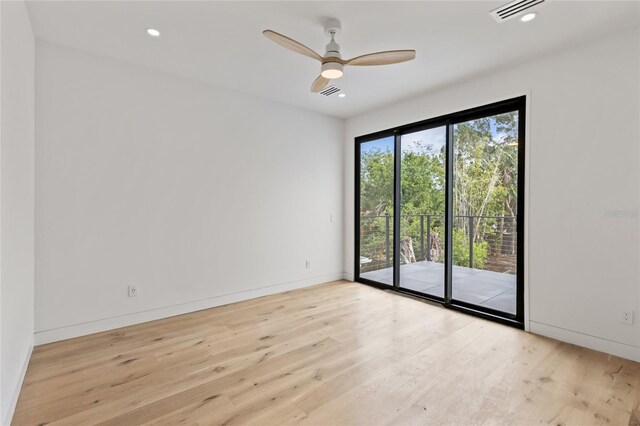 1716 9th St, Sarasota, FL 34236 - spare room with a ceiling fan, baseboards, recessed lighting, wood finished floors, and visible vents