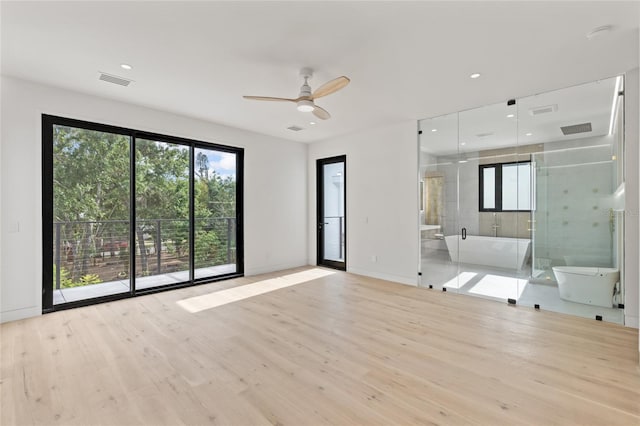 1716 9th St, Sarasota, FL 34236 - unfurnished living room featuring visible vents, ceiling fan, and wood finished floors