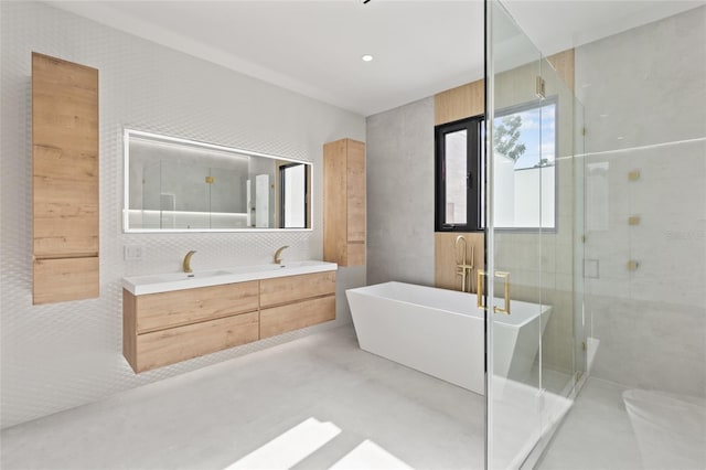 1716 9th St, Sarasota, FL 34236 - bathroom with a freestanding bath, a shower stall, and double vanity
