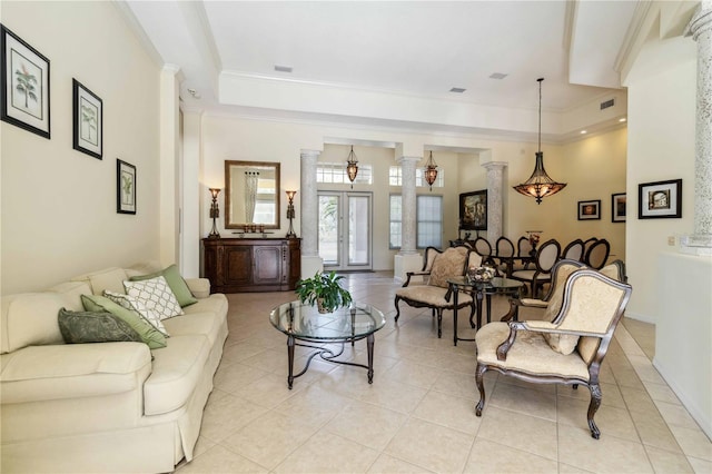 living room featuring light tile patterned floors, visible vents, ornate columns, and ornamental molding