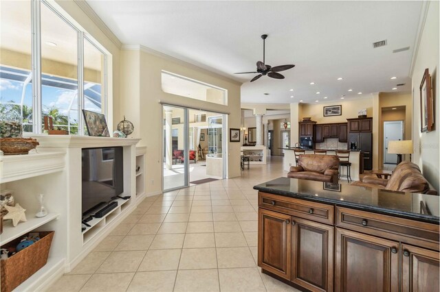 kitchen with visible vents, ceiling fan, light tile patterned floors, recessed lighting, and black fridge with ice dispenser