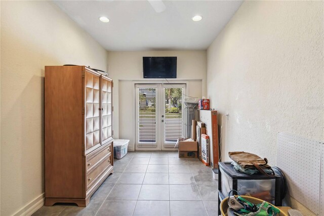 entryway featuring light tile patterned floors, french doors, and recessed lighting