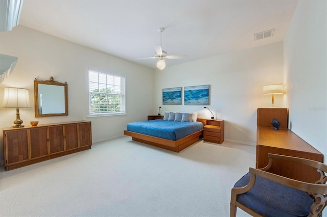 bedroom featuring carpet flooring, baseboards, visible vents, and ceiling fan