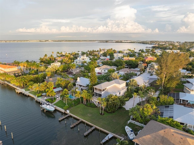 aerial view with a residential view and a water view