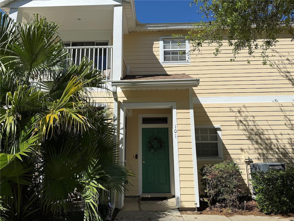 doorway to property with a balcony