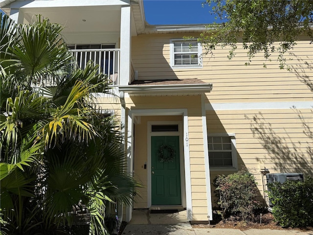 doorway to property with a balcony