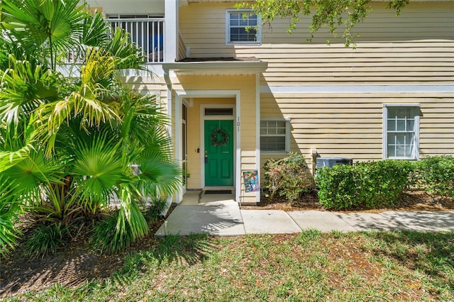property entrance with a balcony