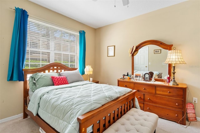 bedroom featuring baseboards, carpet, and ceiling fan