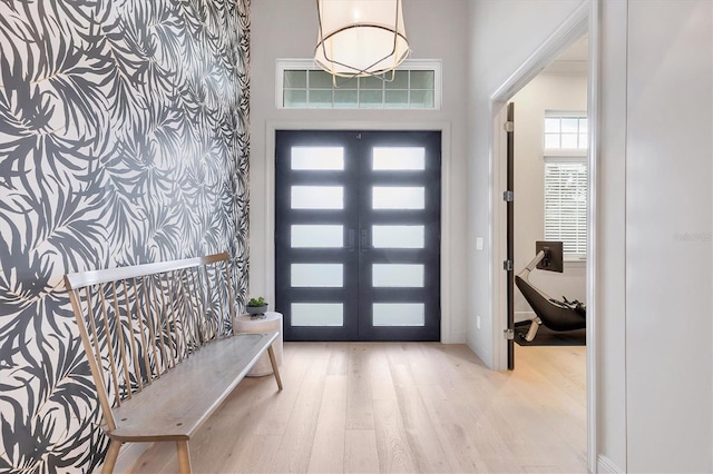 foyer entrance with wood finished floors