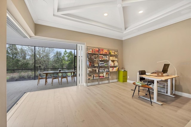 home office featuring recessed lighting, a raised ceiling, baseboards, and wood finished floors