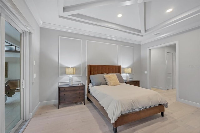 bedroom with visible vents, recessed lighting, light wood-style floors, crown molding, and a decorative wall