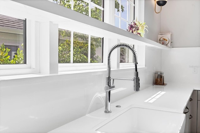 room details with a sink and light countertops