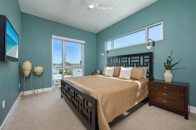 bedroom featuring a ceiling fan, carpet, and baseboards