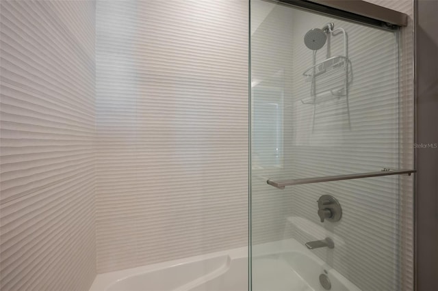 bathroom featuring enclosed tub / shower combo