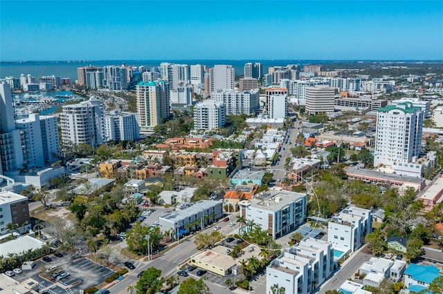 bird's eye view featuring a view of city and a water view