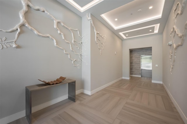 hallway featuring recessed lighting and baseboards