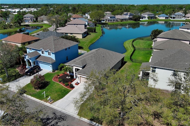 aerial view with a residential view and a water view