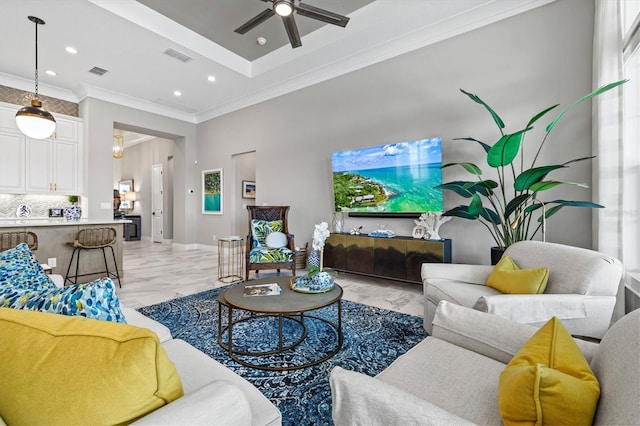 living room with visible vents, marble finish floor, a ceiling fan, and crown molding