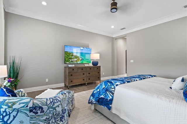 bedroom featuring recessed lighting, visible vents, baseboards, and crown molding